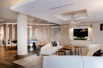 Smart tv lounge with billiards and conversational seating areas