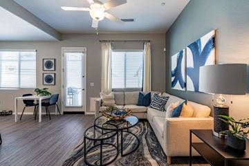 Tolleson apartment for rent - a living room with a couch and a table