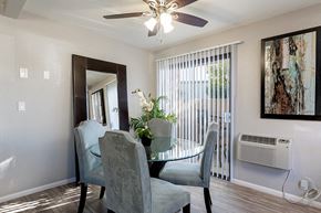 San Diego apartment for rent - A dining room with a glass table and chairs at The Casas Apartments, San Diego