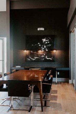 Las Vegas apartment for rent - a dining room with a wooden table and black walls