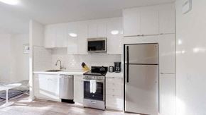 San Francisco apartment for rent - San Francisco, CA Luxury Apartments for Rent - Trinity Place at 1188 - Kitchen with White Cabinets and Stainless-Steel Appliances