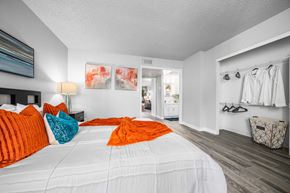 Phoenix apartment for rent - a bedroom with a large bed and a closet