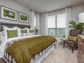 Fort Worth apartment for rent - Bedroom with large bed at The Kelley at Samuels Ave, Fort Worth, Texas