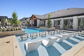 San Marcos apartment for rent - Lounge chairs by the pool at Emerson at Trace, Texas