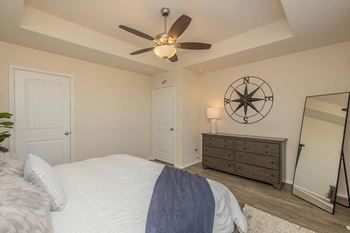 Bedroom with a full size mirror