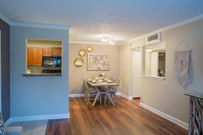 Atlanta apartment for rent - a dining room with a table and chairs