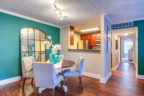 Atlanta apartment for rent - a dining room with a table and chairs