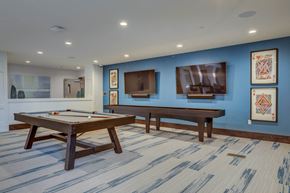 Herriman apartment for rent - a games room with two pool tables and a television