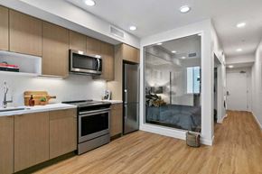 Oakland apartment for rent - a kitchen with a door to a bedroom