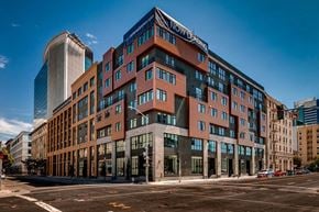 Oakland apartment for rent - a large building on the corner of a city street
