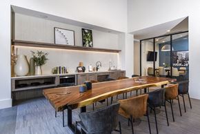 Baltimore apartment for rent - a dining room with a wooden table and chairs