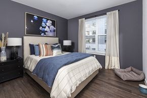 Baltimore apartment for rent - a bedroom with a bed and a window