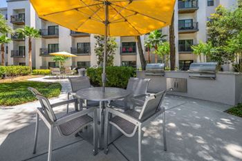 Bbq and patio with seating