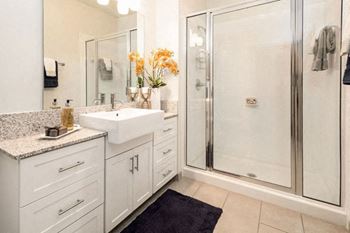 Bathroom with sink and mirror