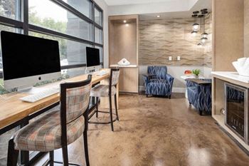 Room with desk, chairs and computers