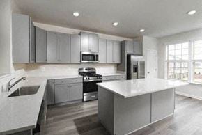 Frederick apartment for rent - a large kitchen with a white counter top