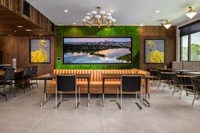Lakewood apartment for rent - a dining room with a table and chairs and a picture on the wall