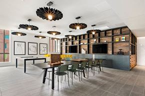 Chicago apartment for rent - a large dining room with a long table and chairs