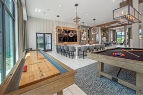 Allen apartment for rent - a game room with a pool table and a bar