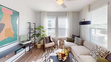 Raleigh apartment for rent - a living room with a couch and a tv