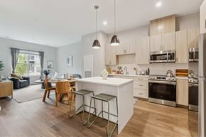 Worcester apartment for rent - a kitchen and living room with an island and stools