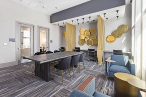 Phoenix apartment for rent - a conference room with a large table and chairs
