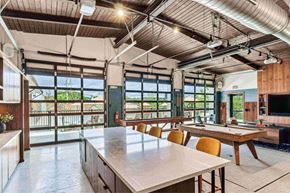 Nashville apartment for rent - a large room with a pool table and a table