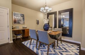 Denver apartment for rent - a dining room with a table and chairs