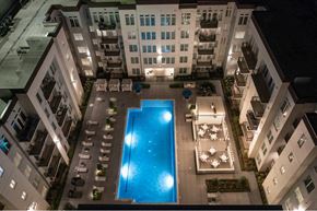 Houston apartment for rent - an overhead view of an apartment building with a swimming pool