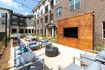Beer garden with tv, outdoor grilling and dining area