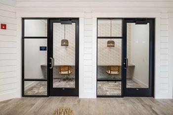 Co-work tech lounge with rentable day offices