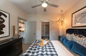 Annapolis apartment for rent - a bedroom with a bed and a ceiling fan