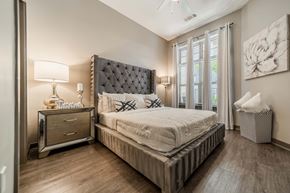 Charlotte apartment for rent - a bedroom with a bed and a window