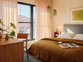 Philadelphia apartment for rent - a bedroom with a bed and a window
