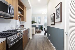 North Hollywood apartment for rent - a kitchen and living room with a stove and a microwave