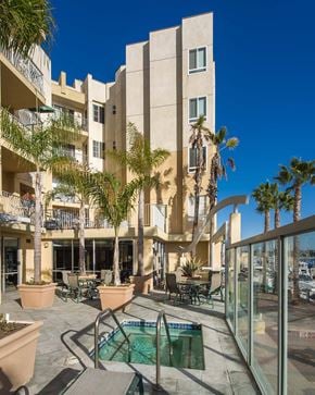 Marina Del Rey apartment for rent - a building with a swimming pool in front of it
