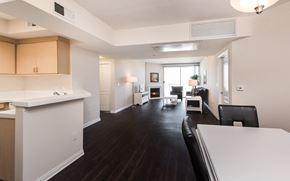 Marina Del Rey apartment for rent - a living room and dining room with white walls and wood floors