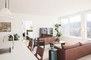 Philadelphia apartment for rent - A living room with a brown couch and a television.