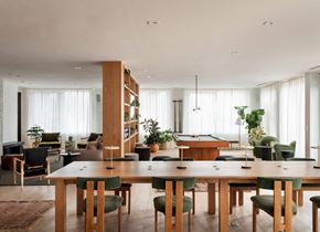 Philadelphia apartment for rent - a living room with windows and plants in it