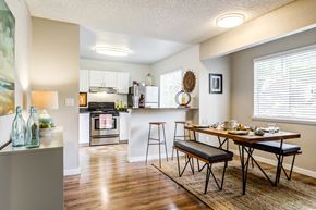 Redmond apartment for rent - A kitchen with a table and chairs in front of it.