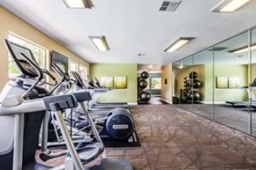 Redmond apartment for rent - A gym with treadmills, exercise balls, and mirrors.