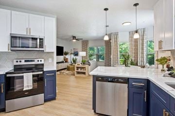 Savannah apartment for rent - A kitchen with a stove top oven and a dishwasher.