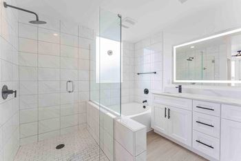 Glass-enclosed showers