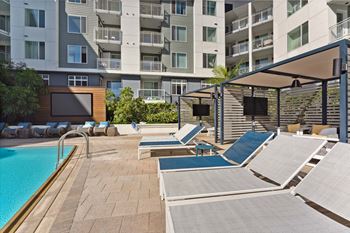 Sundecks with poolside cabanas & lounge seating
