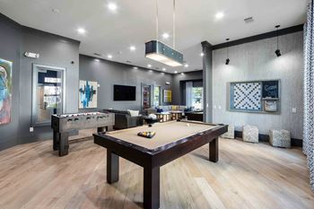 24-Hour game room with pool table and shuffleboard