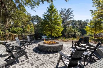 Outdoor kitchen and fire pit lounge
