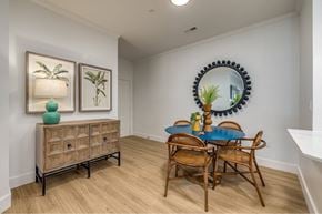Charlotte apartment for rent - A dining room with a blue table and chairs.