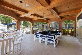 Cabana area with tv and fire pit