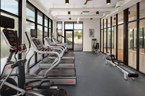 Atlanta apartment for rent - A row of treadmills are lined up in a gym.
