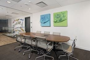 Chicago apartment for rent - A conference room with a long table and chairs.
